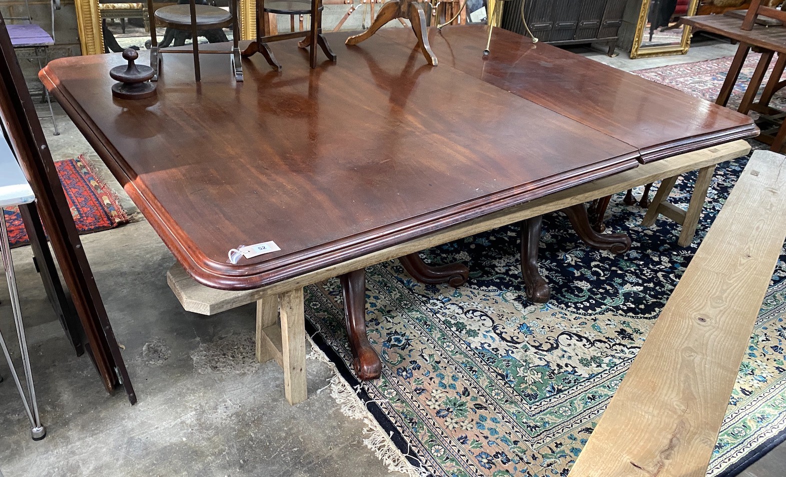 A Victorian mahogany twin pillar dining table, in need of restoration, length 203cm, width 138cm, height 75cm